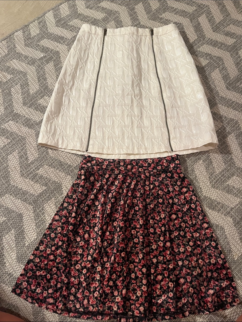 Hollister Floral Skirt & Xhill. White Textured Mini Skirt with Dual Zips
(Bundle